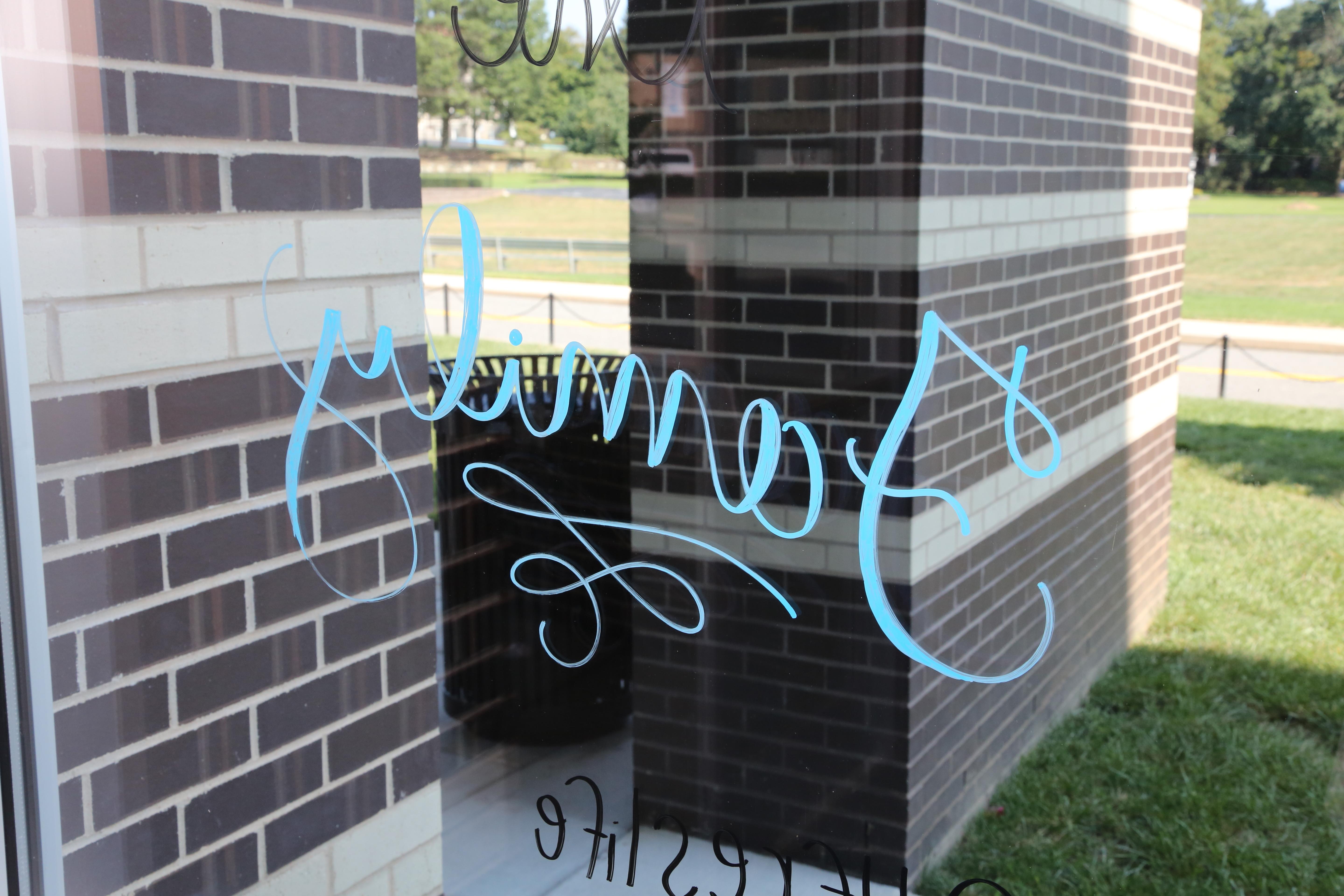 Family written on campus building